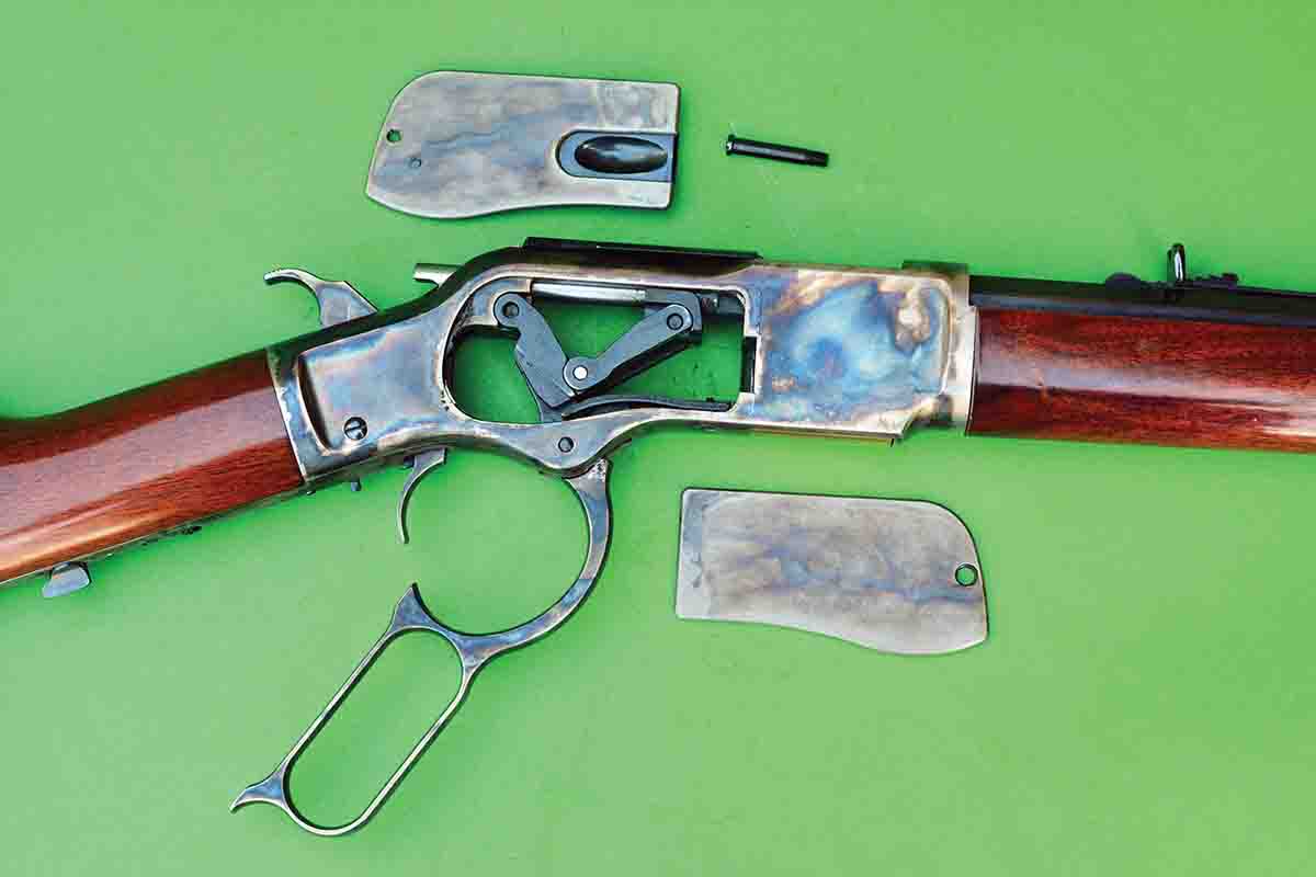 The Model 1873 had several notable improvements including removable side plates that allowed easy cleaning. Note the toggle link action design.